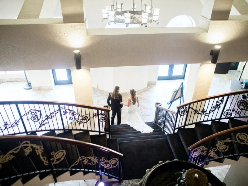 Bride Walking Down Madrid Theatre Staircase